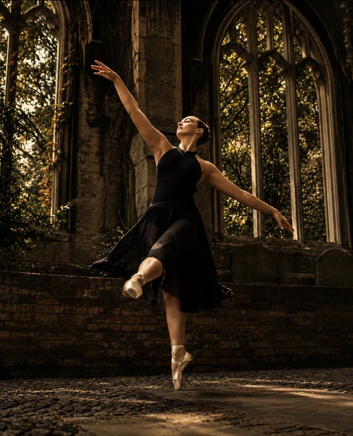 Ballet dancer in gothic architecture