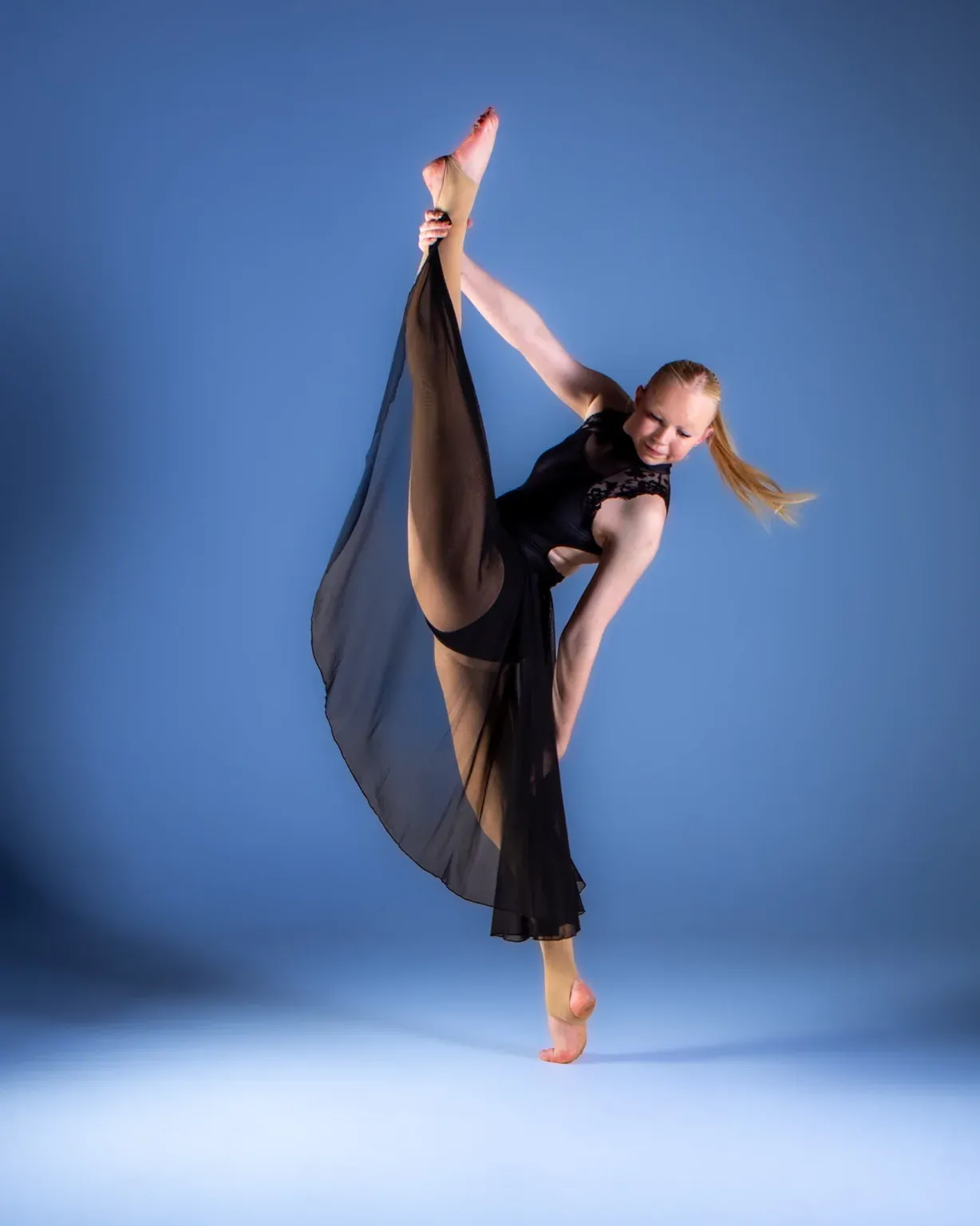 Dance studio portrait with dramatic extension